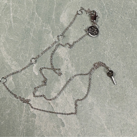 The Giving Trees Believe dainty tiny silver key charm - Picture 3 of 5